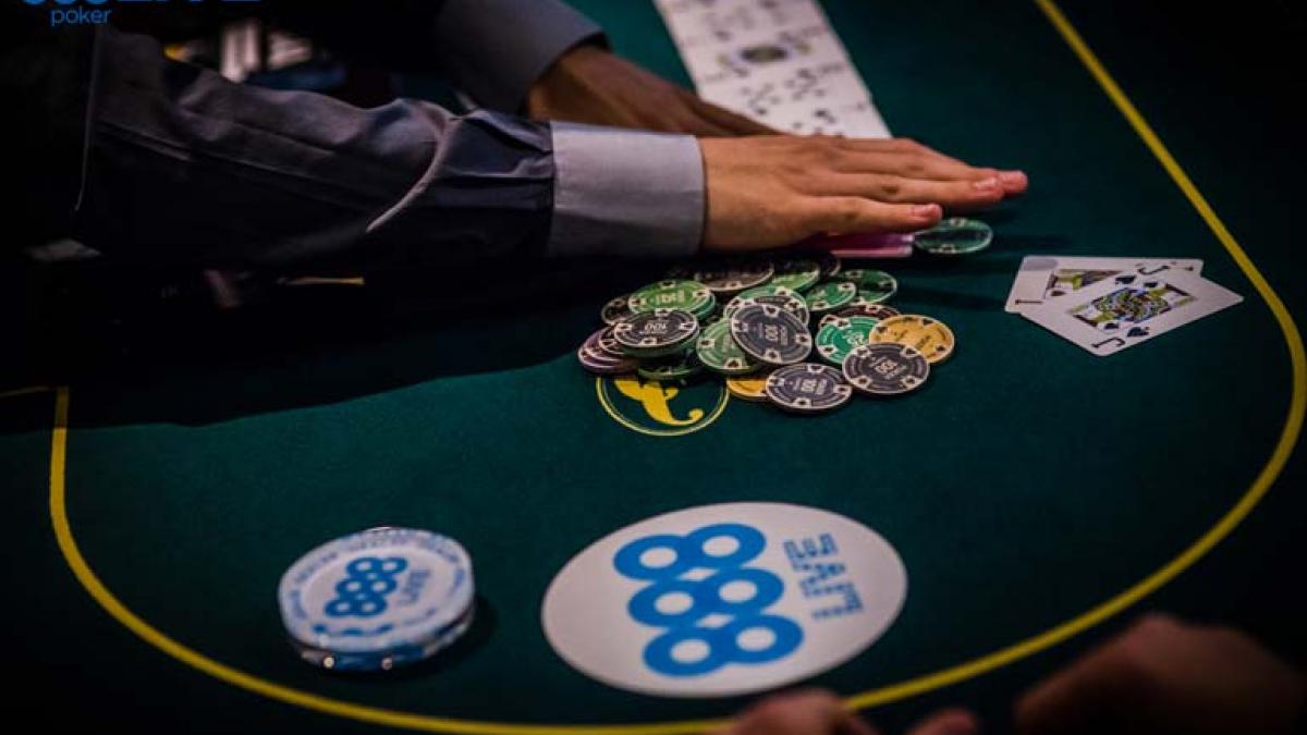 poker table with cards and chips