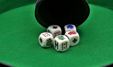 Shake Your Poker Game Up with Poker Dice!